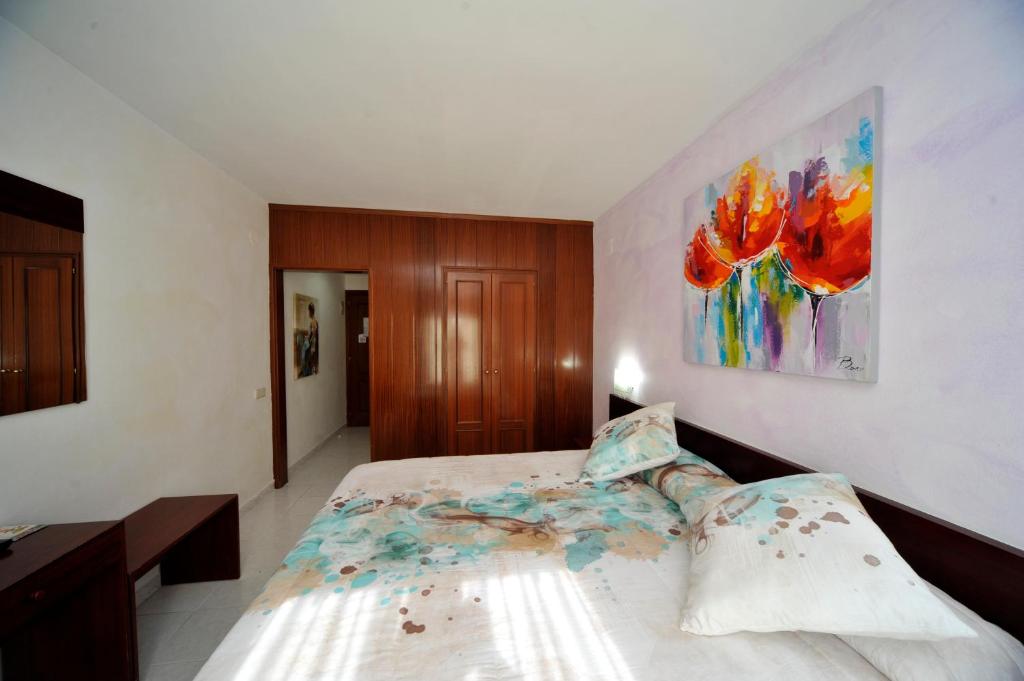 Postel nebo postele na pokoji v ubytování Hotel Vall d´Aneu