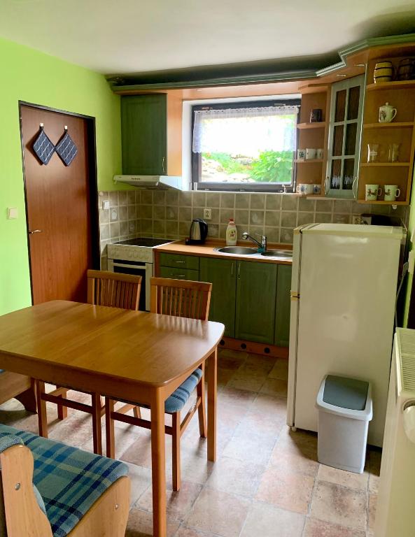 Kuchyň nebo kuchyňský kout v ubytování Apartman Daniela