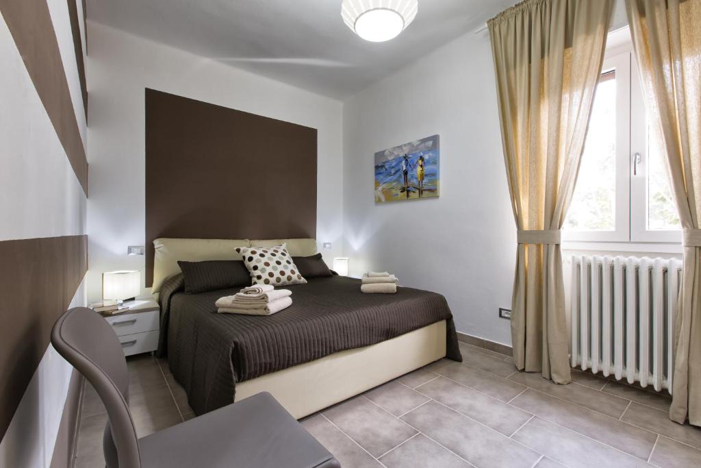 Postel nebo postele na pokoji v ubytování B&B Civico 1