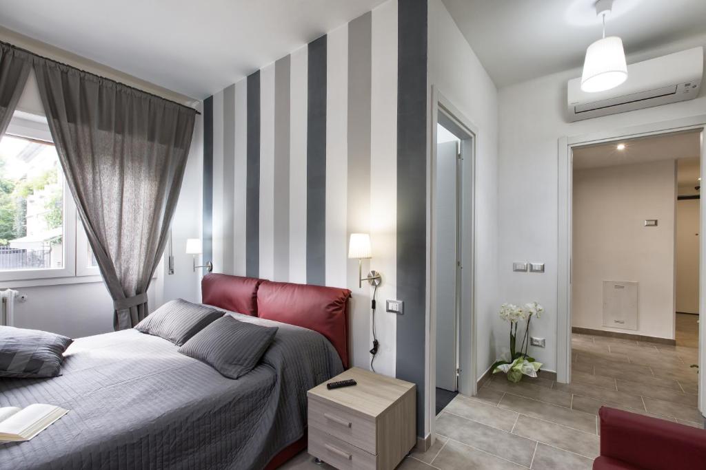Postel nebo postele na pokoji v ubytování B&B Civico 1