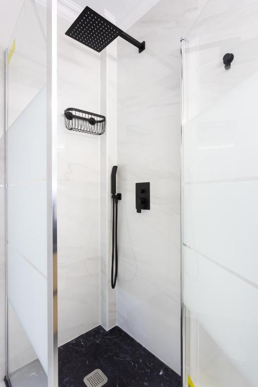 a shower with a glass door in a bathroom at Apartamento Clara in Los Cristianos