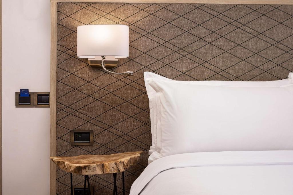Una cama o camas en una habitación de Radisson Blu Resort Al Hoceima