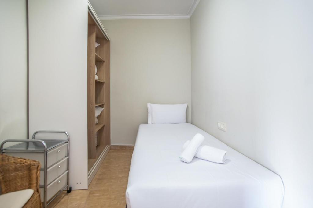 Posteľ alebo postele v izbe v ubytovaní 42man1018 Centrally located flat in Sant Antoni