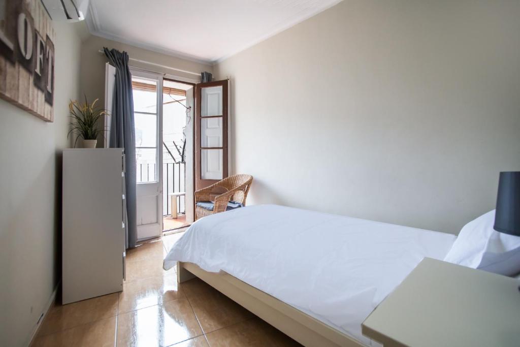 Posteľ alebo postele v izbe v ubytovaní 42man1018 Centrally located flat in Sant Antoni
