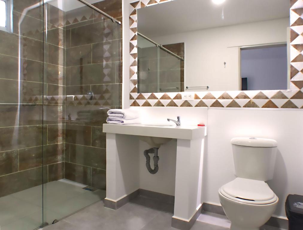Koupelna v ubytování El Oscar Hotel
