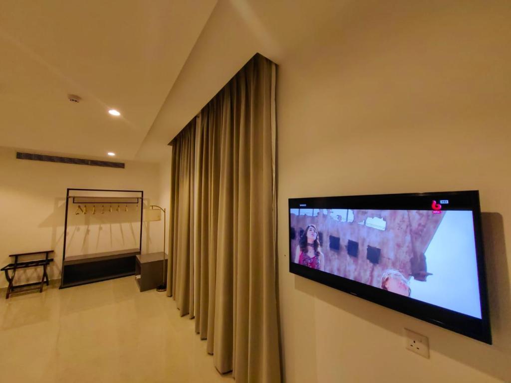 TV a/nebo společenská místnost v ubytování Wave View Hotel
