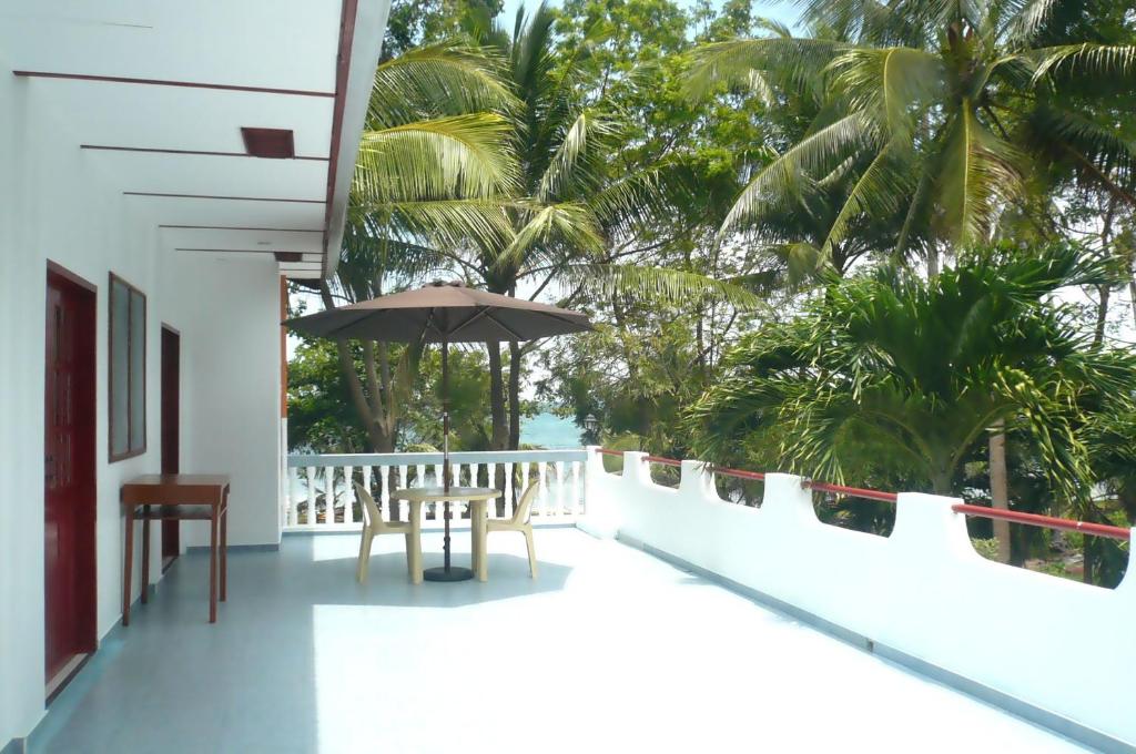 Un balcón o terraza en Villa Juana
