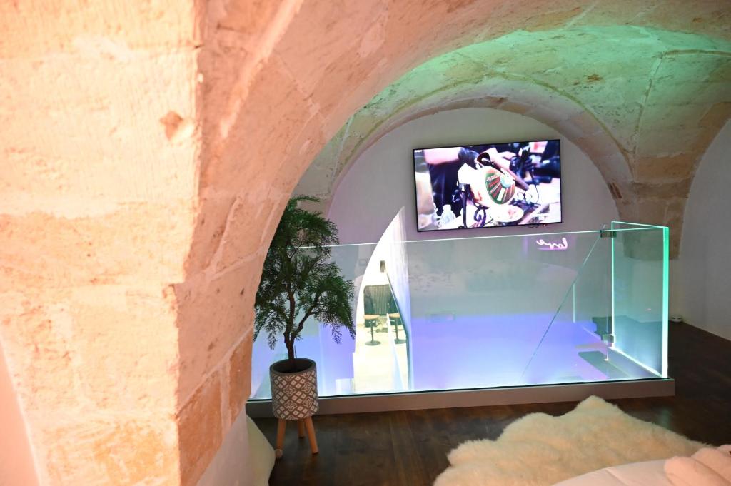 TV a/nebo společenská místnost v ubytování Suite Cavour Exclusive House Private Luxury SPA