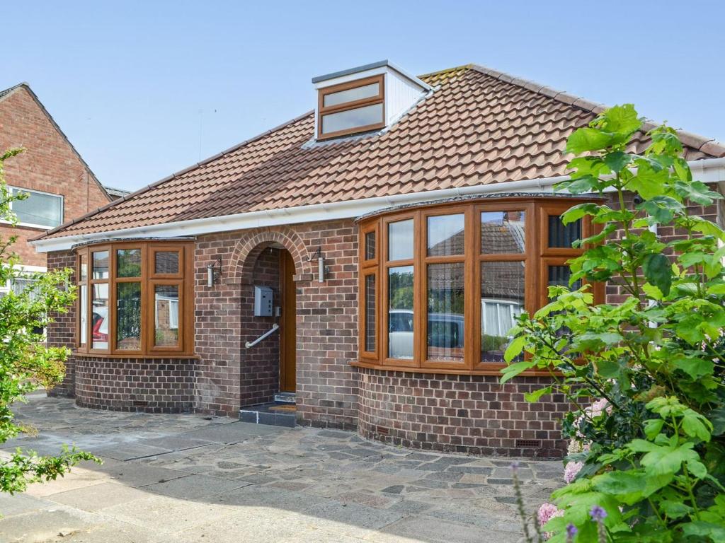 an extension to a house with a conservatory at Trinity Avenue Cottage in Bridlington