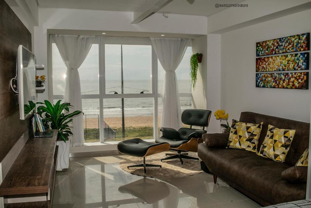 Χώρος καθιστικού στο Flat Beira Mar Recife - Praia de Piedade