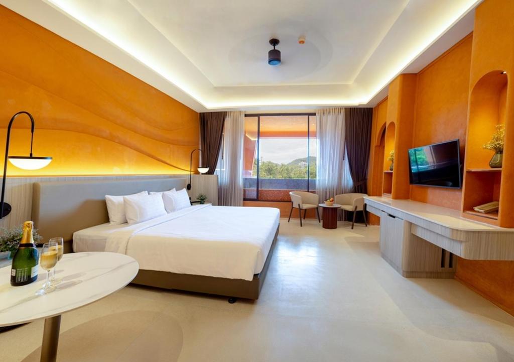 Postel nebo postele na pokoji v ubytování Hotel Adam Krabi
