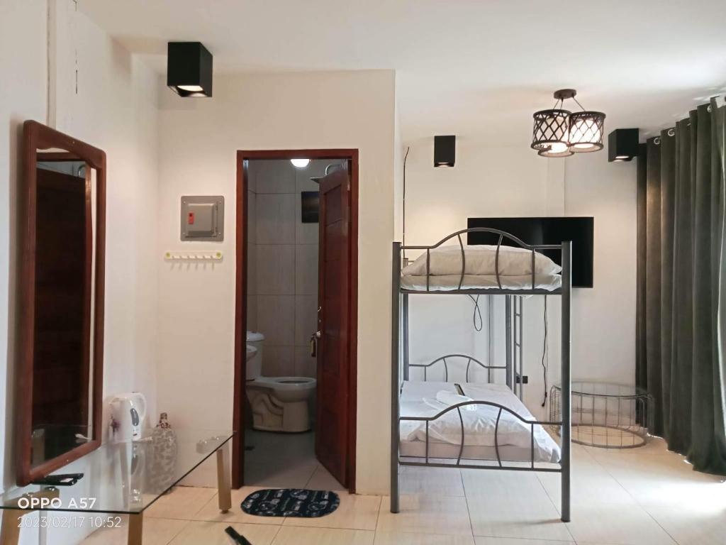 Postel nebo postele na pokoji v ubytování Villa Royal Palawan