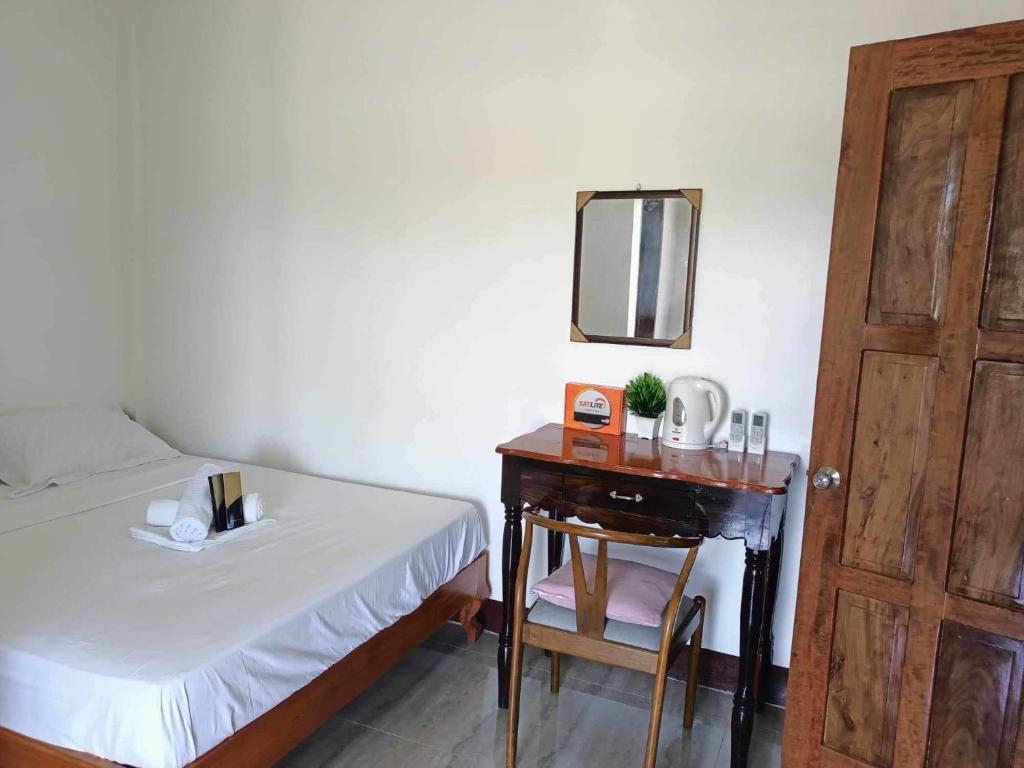 Postel nebo postele na pokoji v ubytování Villa Royal Palawan