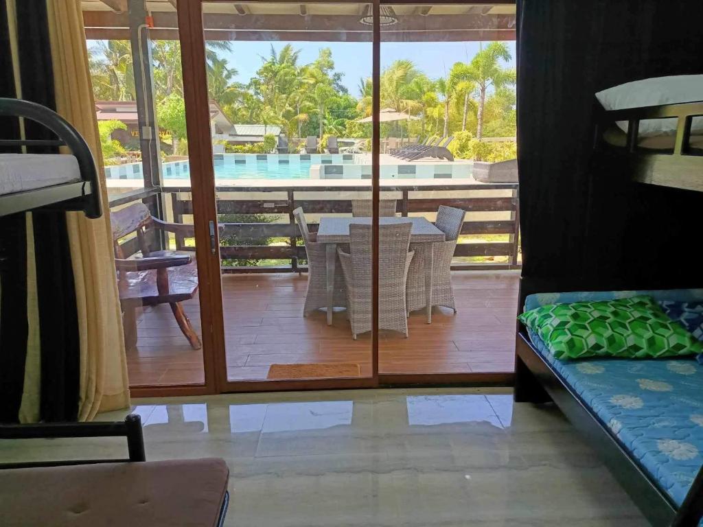 Postel nebo postele na pokoji v ubytování Villa Royal Palawan