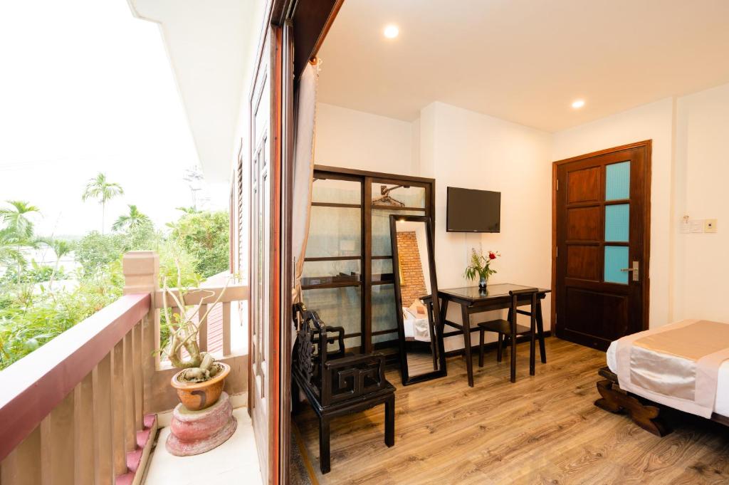 Postel nebo postele na pokoji v ubytování B'Lan Riverside Villa