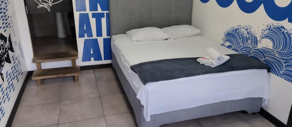Letto o letti in una camera di Hostal Loco Coco Loco