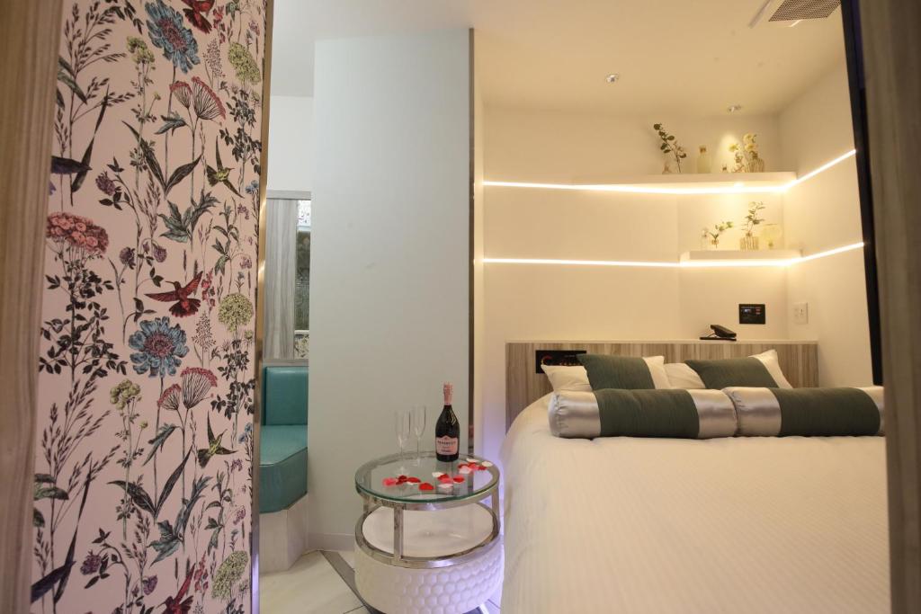 Postel nebo postele na pokoji v ubytování Hotel Blanche 大人専用 Adult only hotel