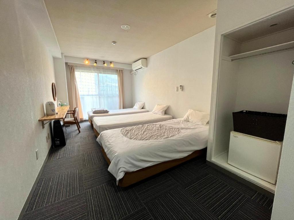 Cama o camas de una habitación en CHENDA INTERNATIONAL HOTEL - Vacation STAY 82740v