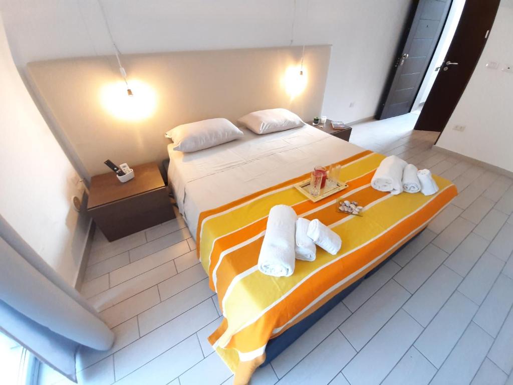 Postel nebo postele na pokoji v ubytování Dimore centro Lecce Affittacamere B&B