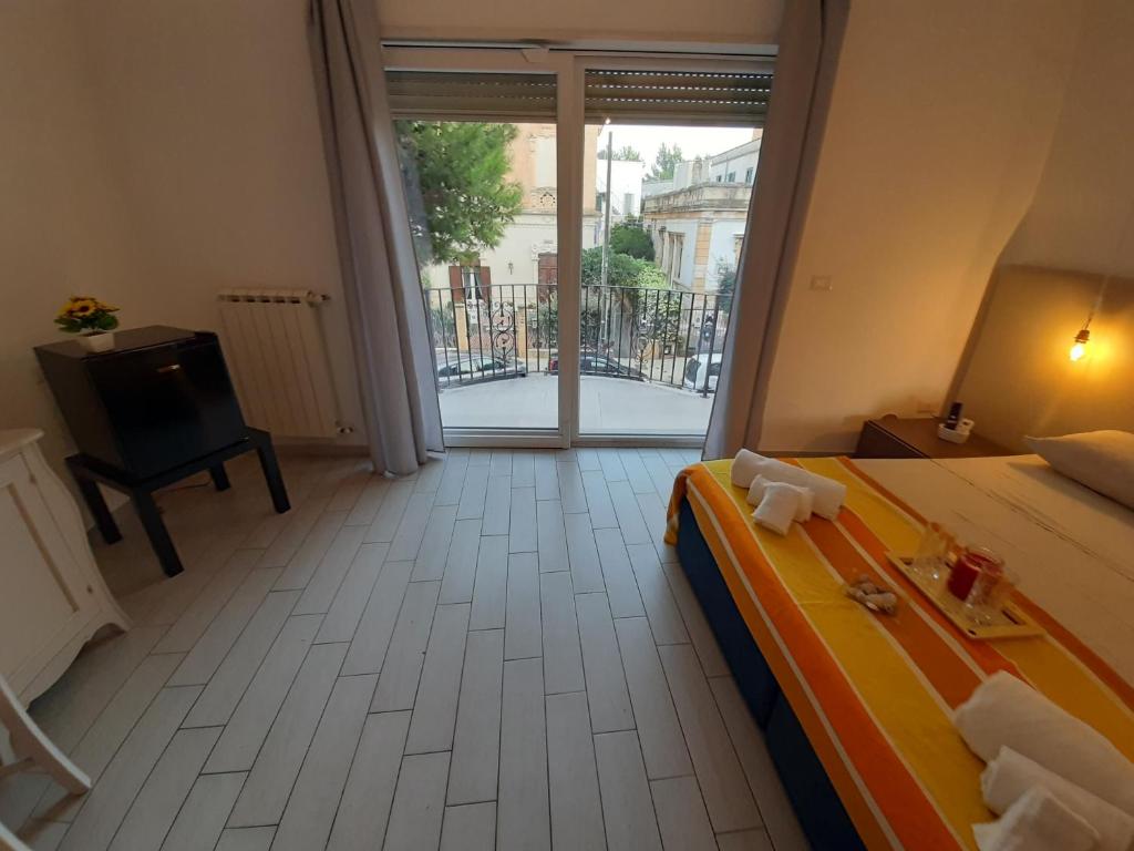 Postel nebo postele na pokoji v ubytování Dimore centro Lecce Affittacamere B&B