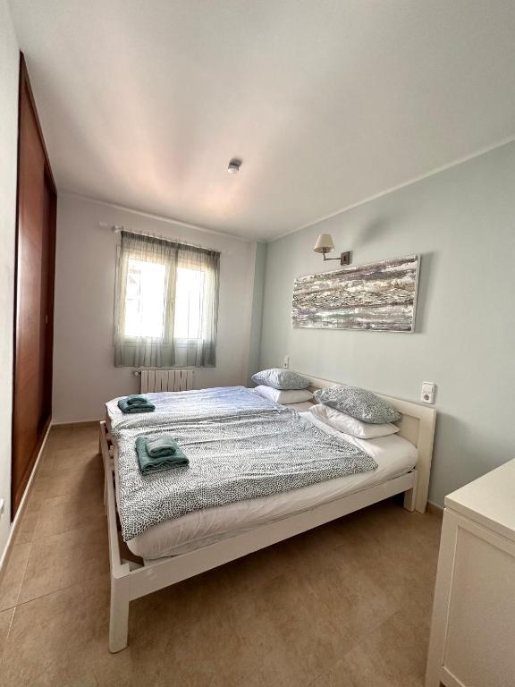 Postel nebo postele na pokoji v ubytování Dimi Holidays Porto Cristo SLU Meerblick Apartment 2 -Hafen Porto Cristo 120 m zum Strand