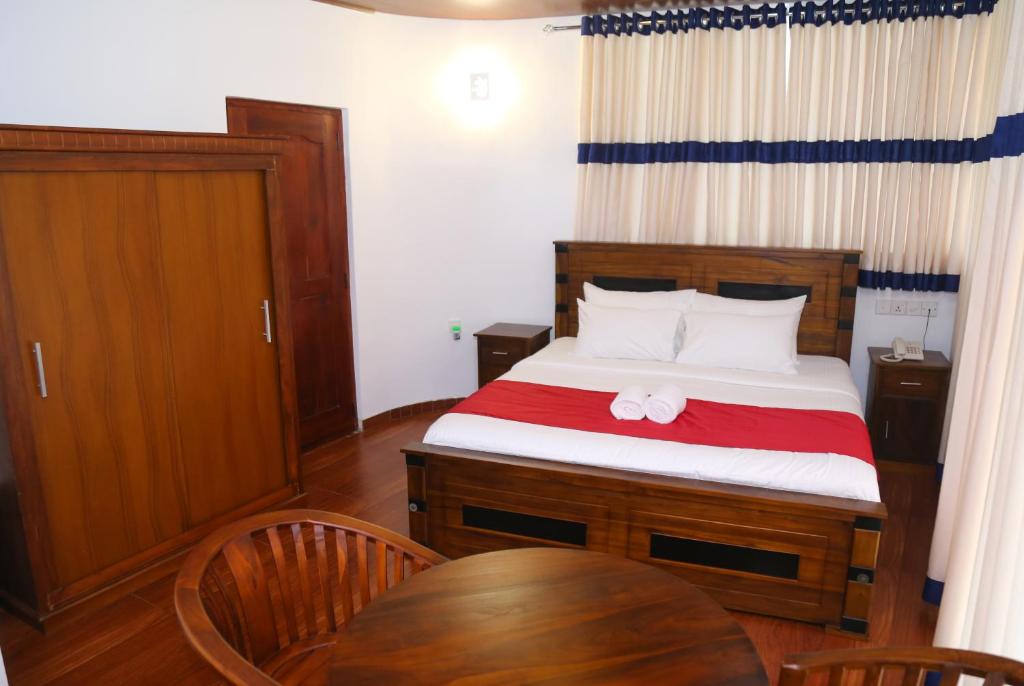 Postel nebo postele na pokoji v ubytování Hotel Sara