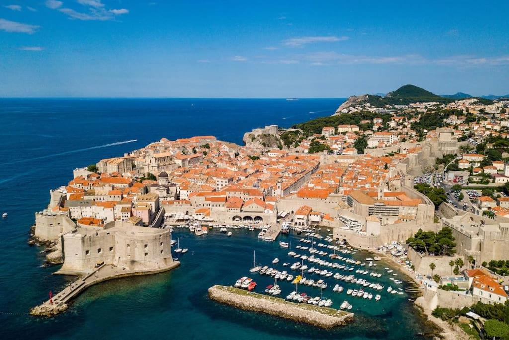 an aerial view of a city with boats in the water at New modern accommodation in city in Metković