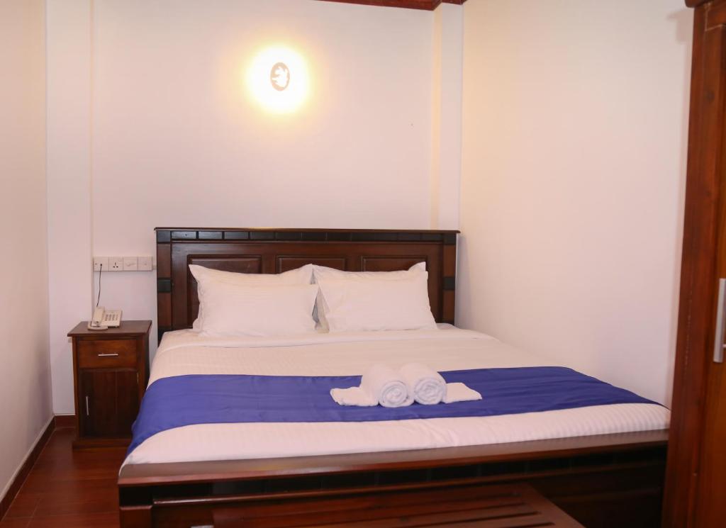 Postel nebo postele na pokoji v ubytování Hotel Sara