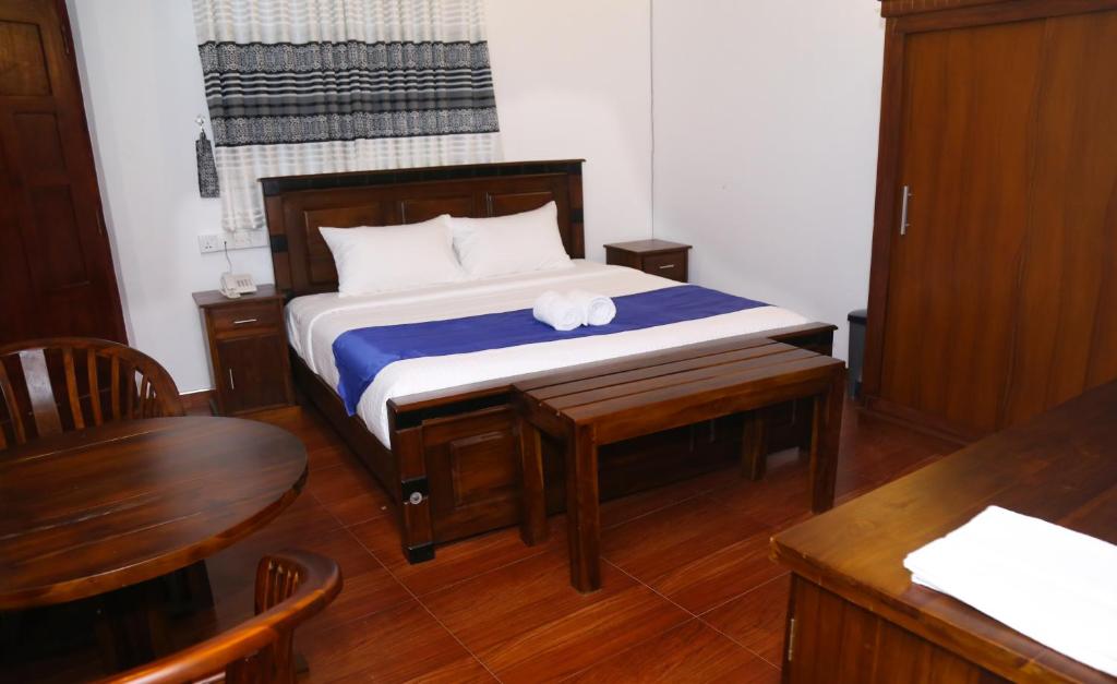 Postel nebo postele na pokoji v ubytování Hotel Sara
