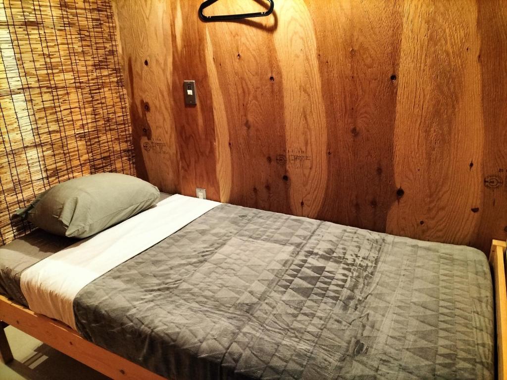Postel nebo postele na pokoji v ubytování Vacation"Ninja"house Secretbase near Asakusa
