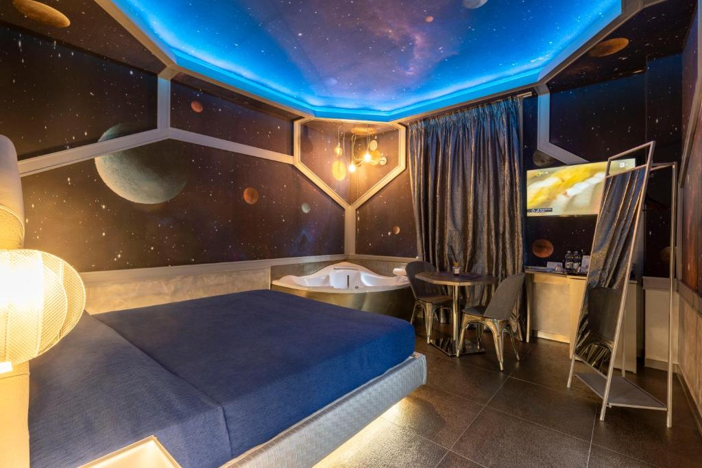 Postel nebo postele na pokoji v ubytování Suite Dreams Montecatini