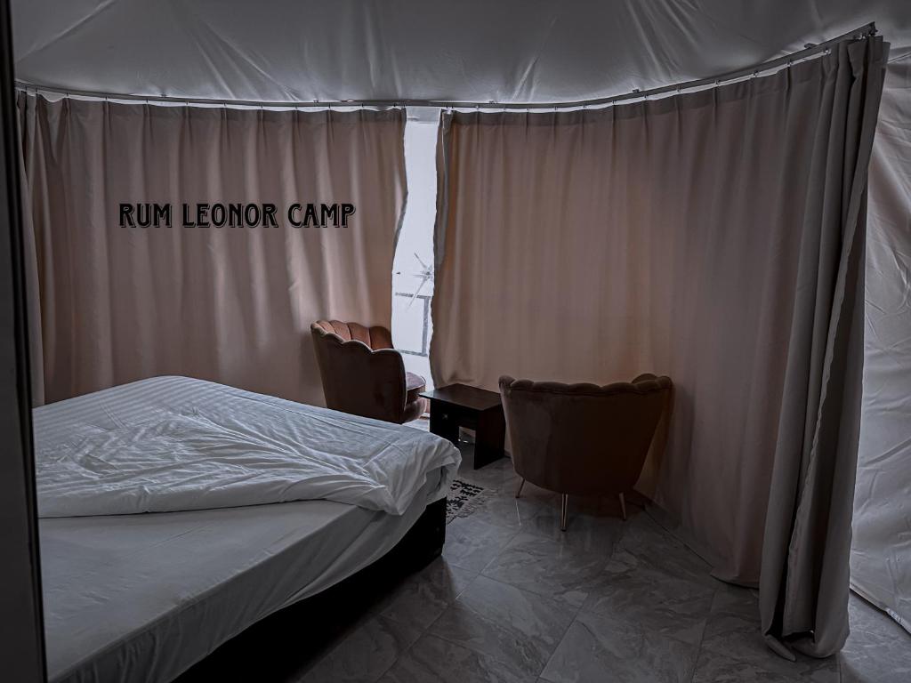 Postel nebo postele na pokoji v ubytování RUM LEONOR CAMP