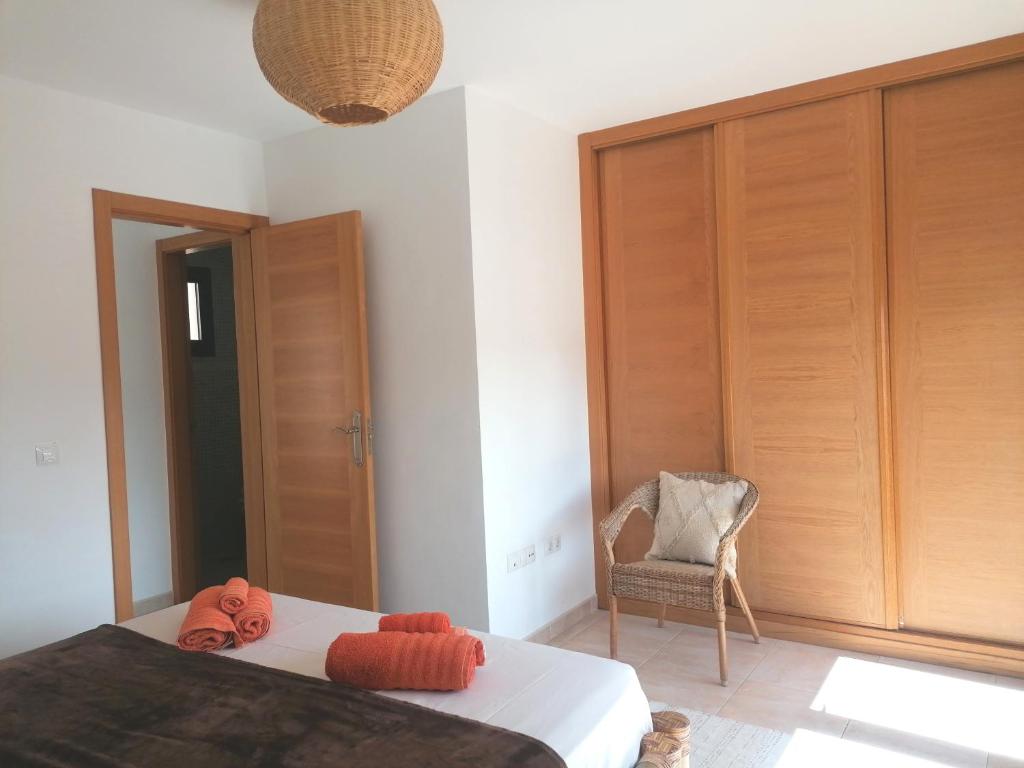 Postel nebo postele na pokoji v ubytování Casa en Cotillo Lagos with Wifi & Netflix