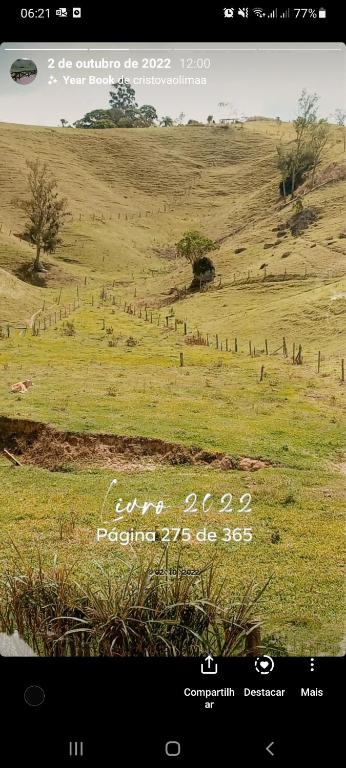 página de un sitio web que muestra un campo con animales en SitioVôTeco, en Armazém