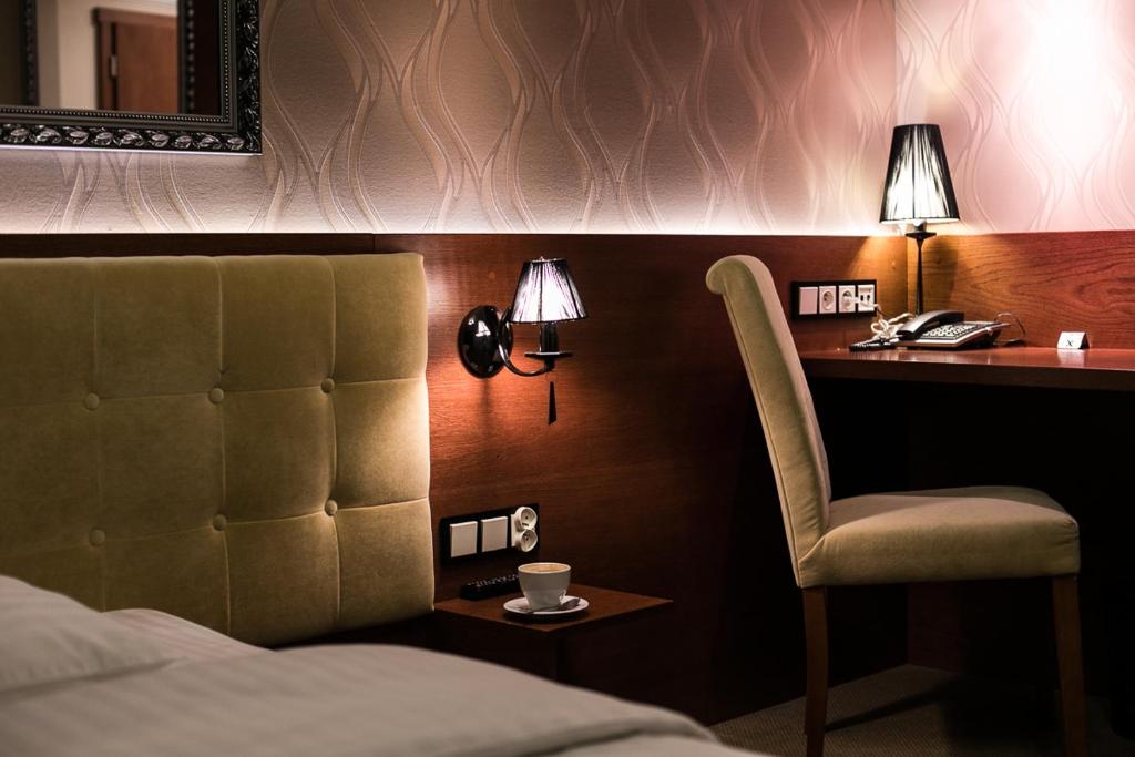 Postel nebo postele na pokoji v ubytování Hotel&Spa Kameleon