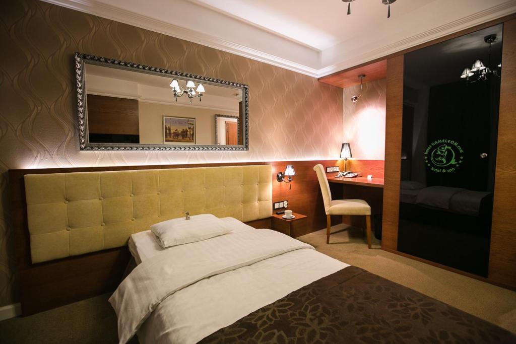 Postel nebo postele na pokoji v ubytování Hotel&Spa Kameleon