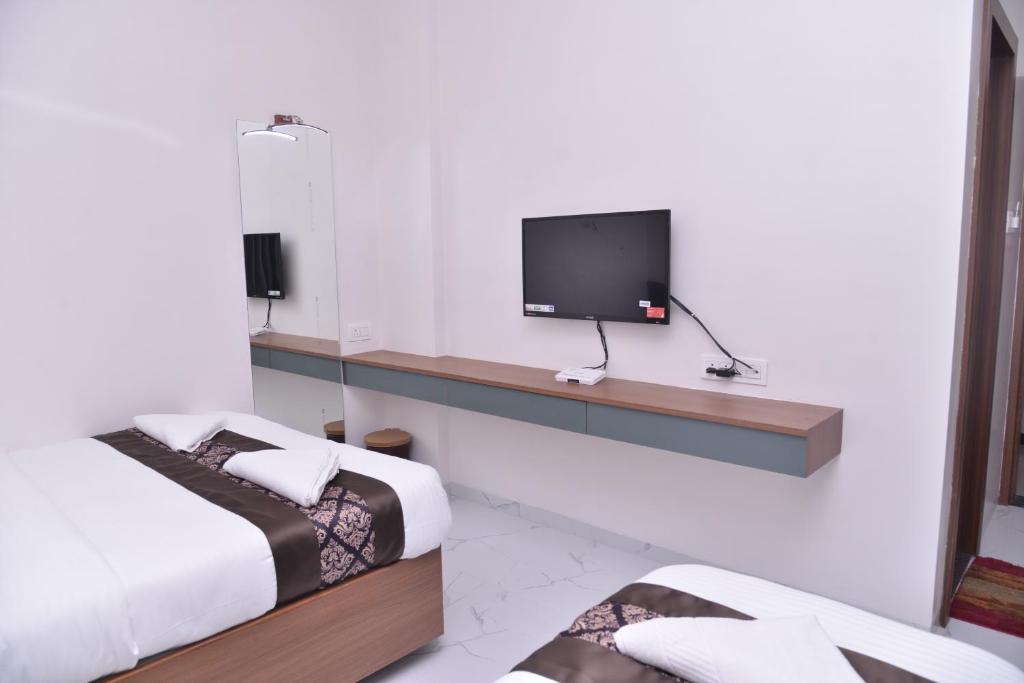 TV a/nebo společenská místnost v ubytování Hotel D Square