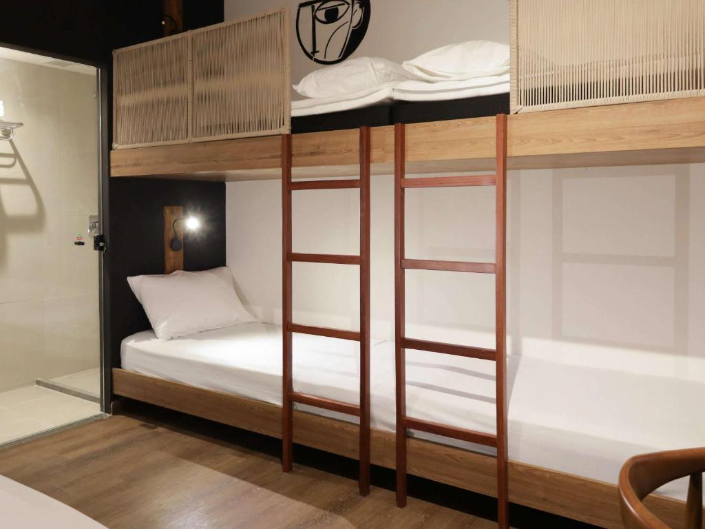 Postel nebo postele na pokoji v ubytování ibis Styles Maceió Pajuçara