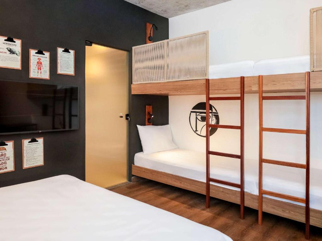 Postel nebo postele na pokoji v ubytování ibis Styles Maceió Pajuçara