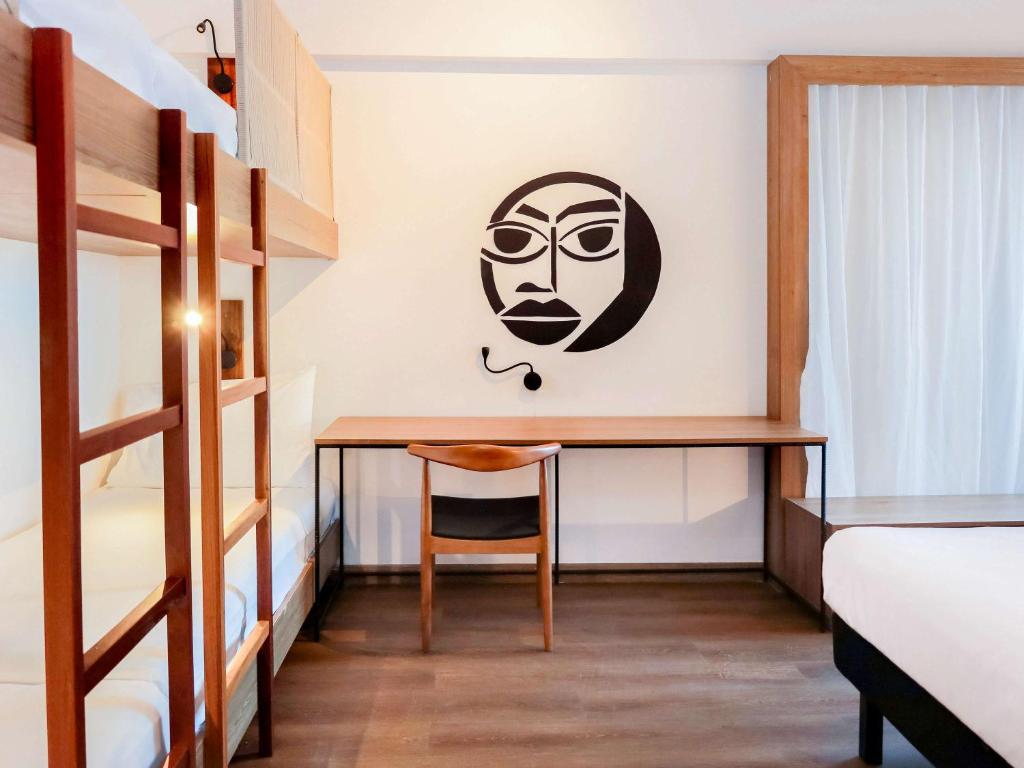 Postel nebo postele na pokoji v ubytování ibis Styles Maceió Pajuçara