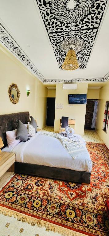 Postel nebo postele na pokoji v ubytování Riad Amazing