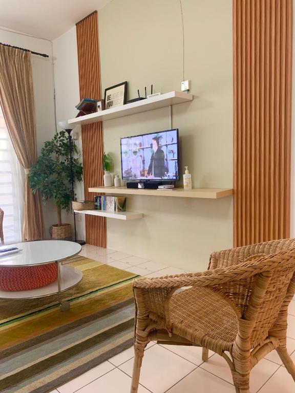 TV a/nebo společenská místnost v ubytování D'Houzz