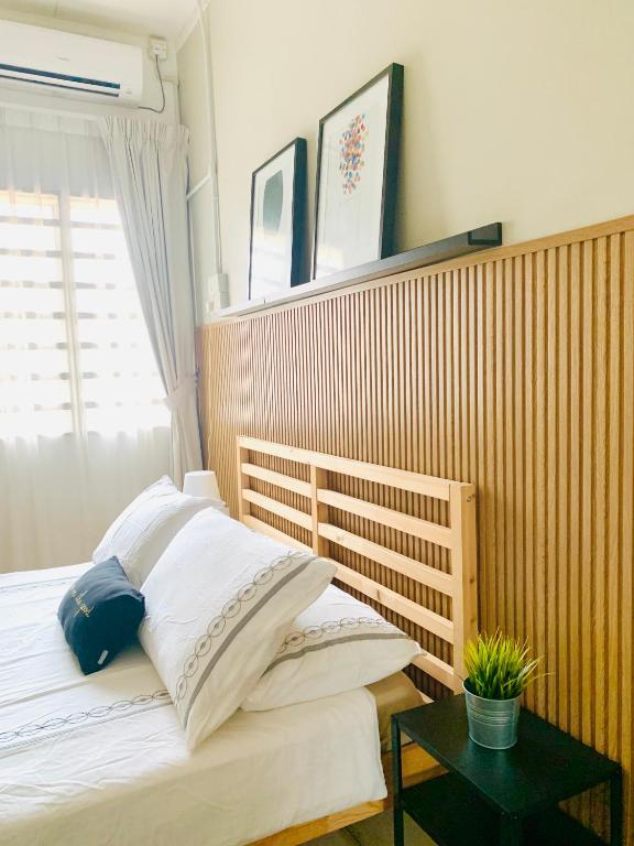 Postel nebo postele na pokoji v ubytování D'Houzz