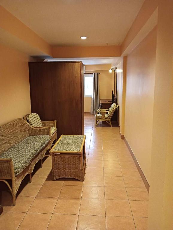 Postel nebo postele na pokoji v ubytování Nid Huahin Hotel