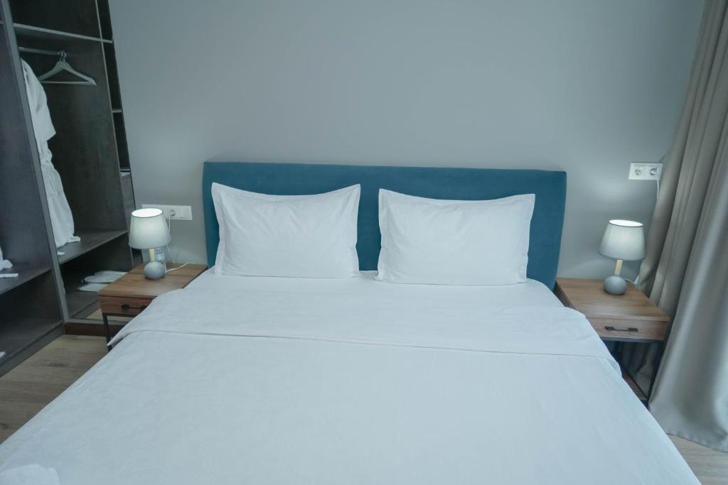 Postel nebo postele na pokoji v ubytování Gastello hotel