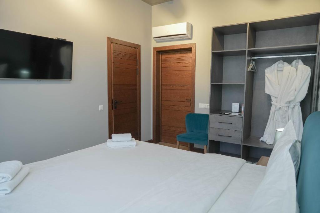 Postel nebo postele na pokoji v ubytování Gastello hotel