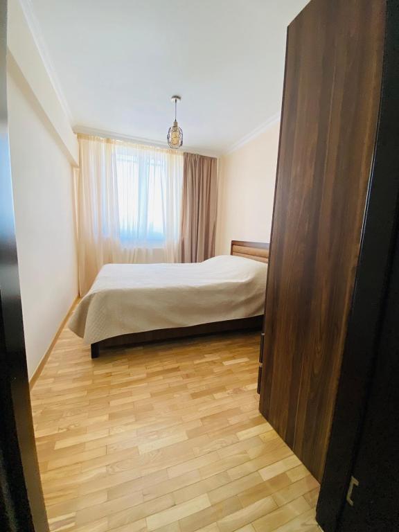Postel nebo postele na pokoji v ubytování Надежда