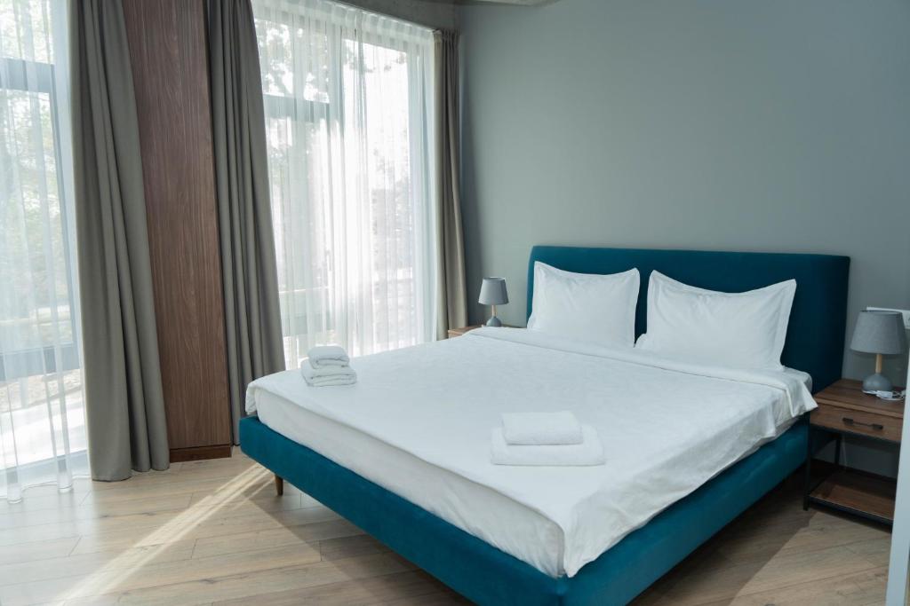 Postel nebo postele na pokoji v ubytování Gastello hotel