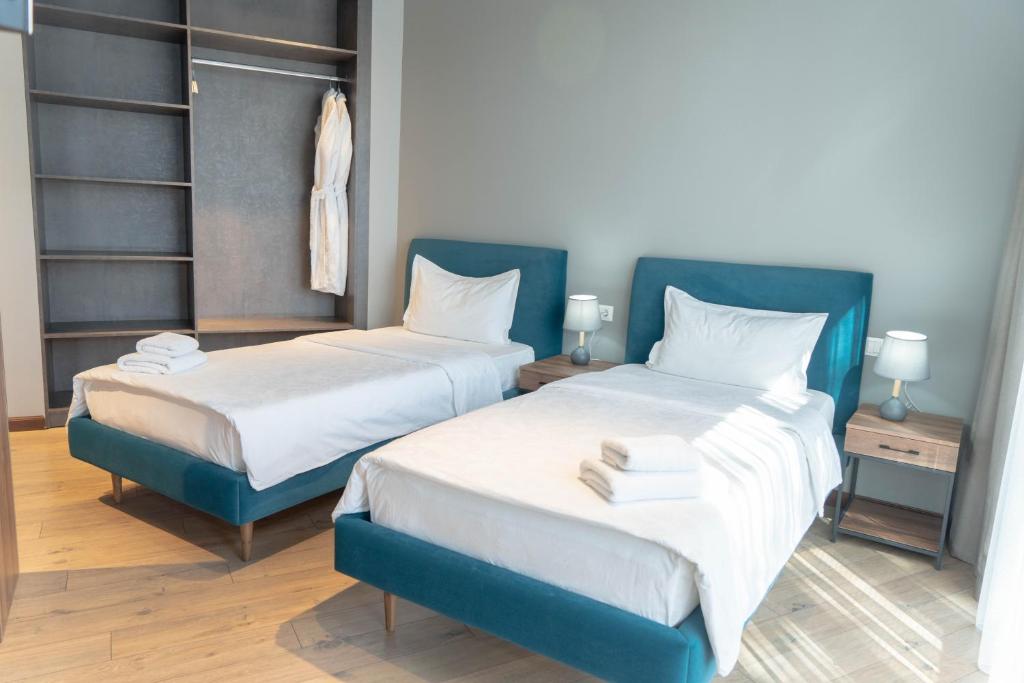 Postel nebo postele na pokoji v ubytování Gastello hotel