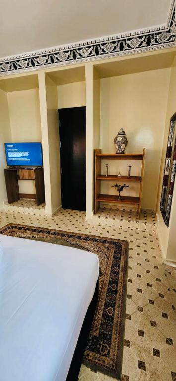 Postel nebo postele na pokoji v ubytování Riad Amazing